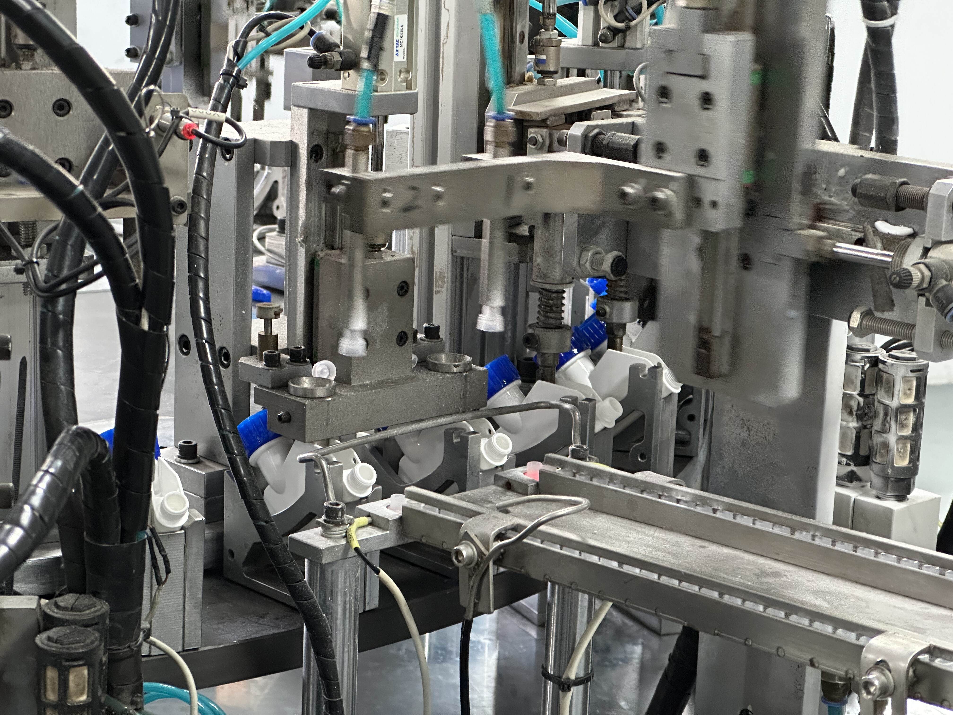 trigger Sprayer Assembly machine,automated machines,automated assembly equipment,custom automation assembly machines