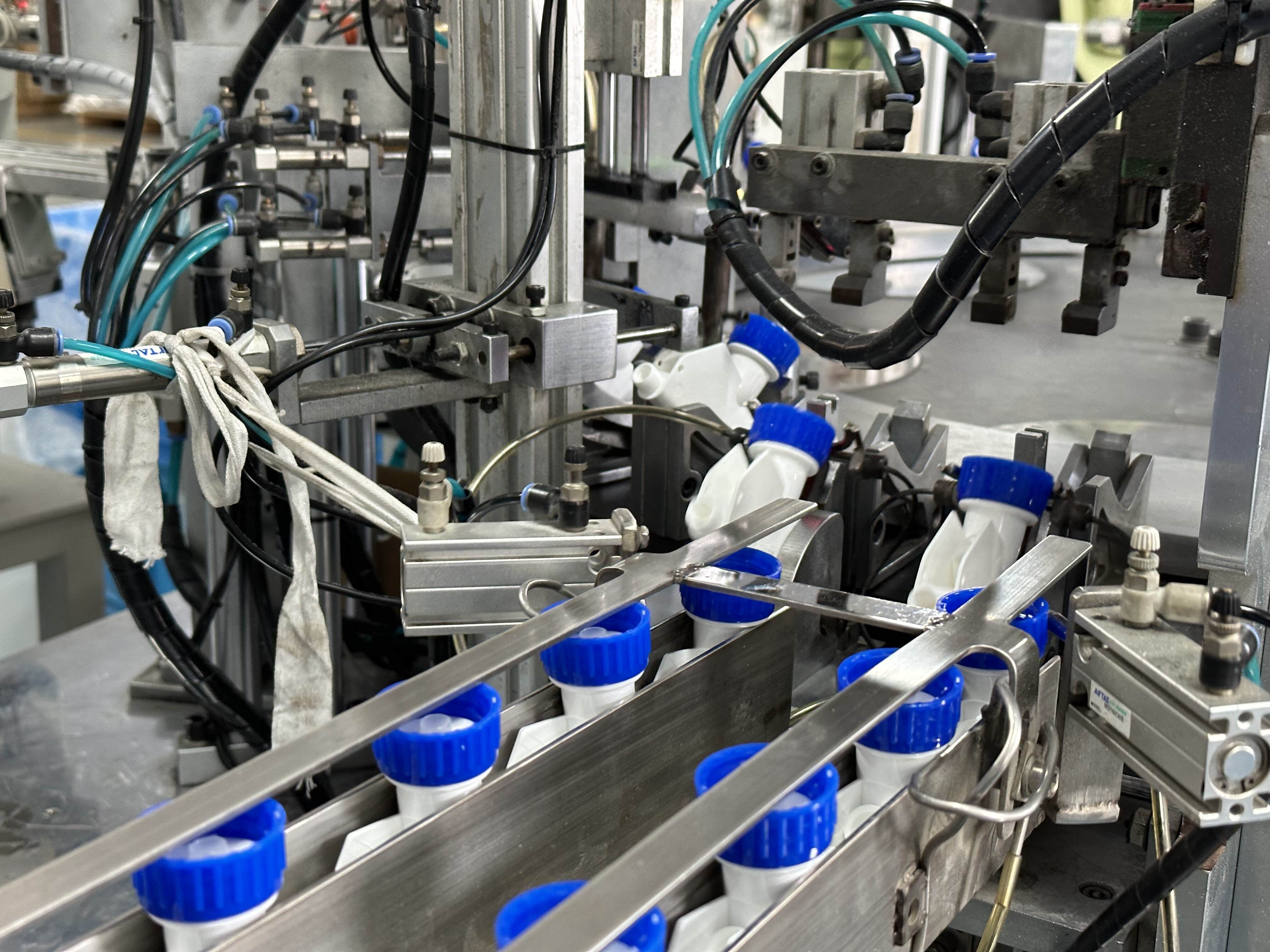 trigger Sprayer Assembly machine,automated machines,automated assembly equipment,custom automation assembly machines