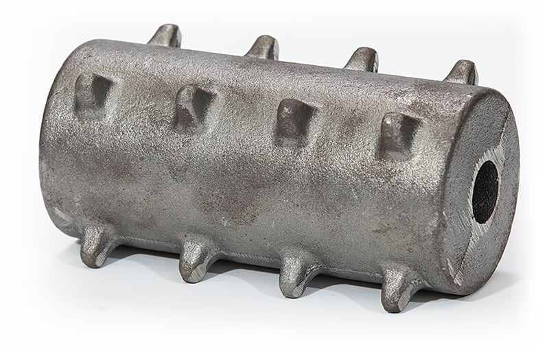 Close-up of multiple grey iron castings after quality control