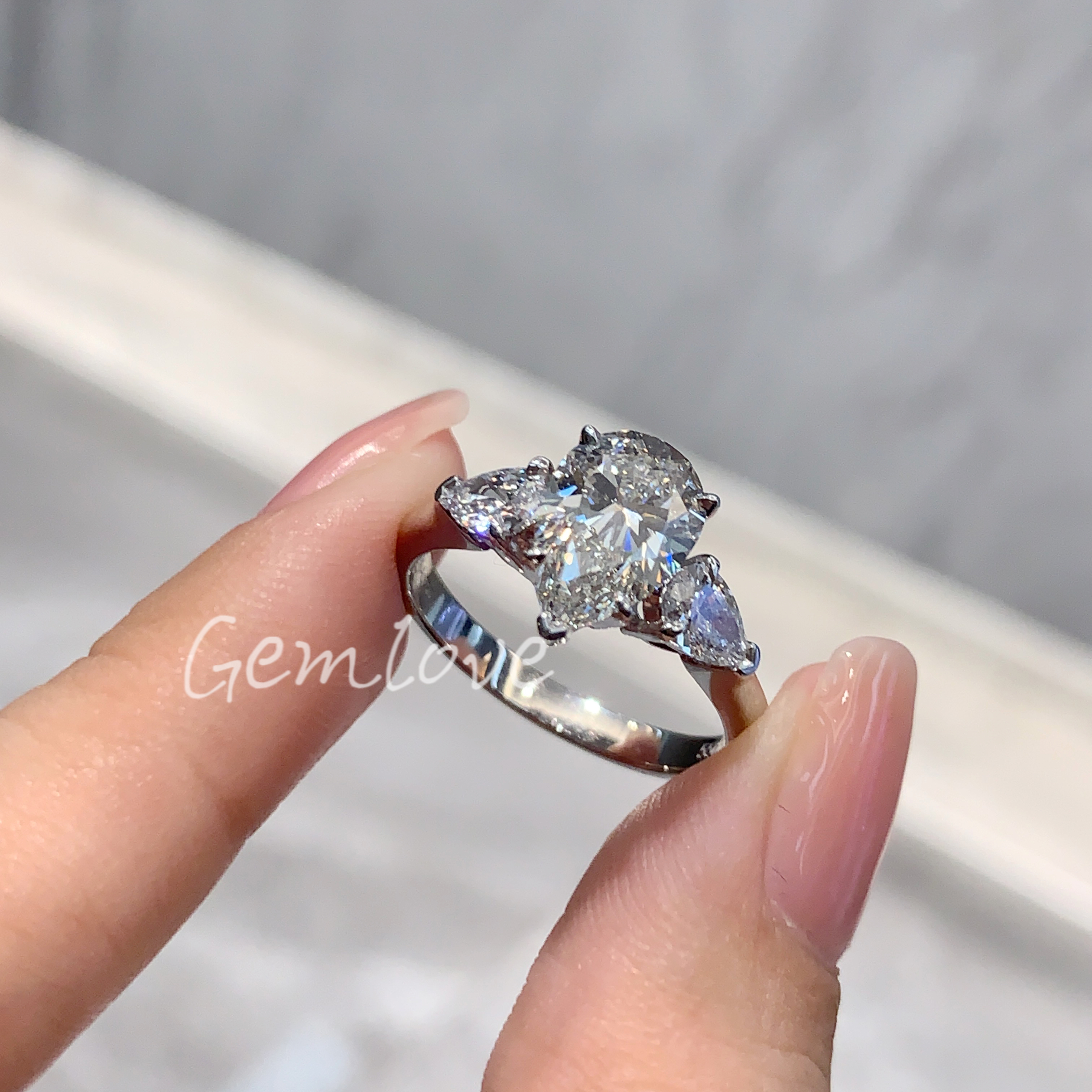 18K 2ct teardrop three-stone ring