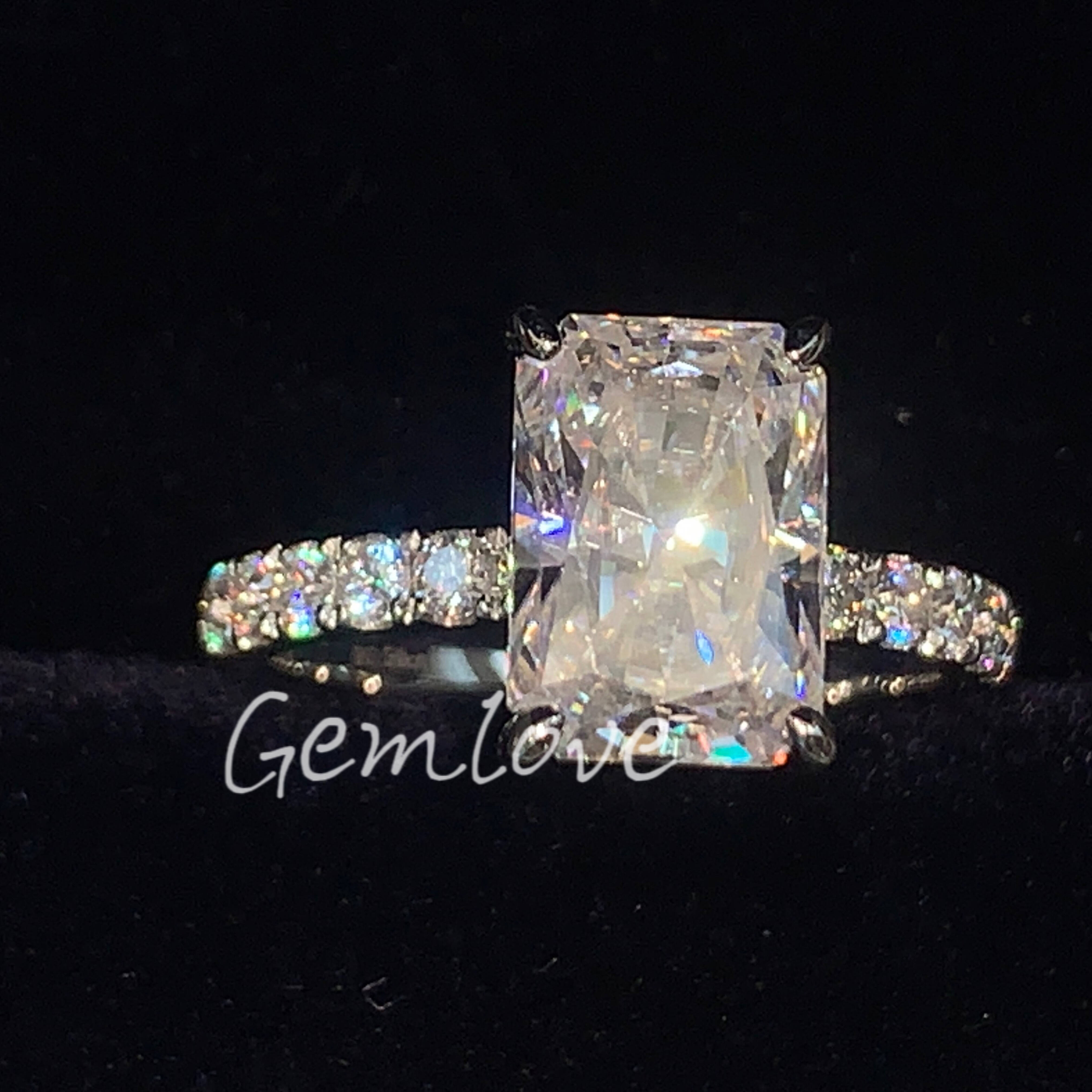 18k white gold ring featuring a breathtaking 3-carat emerald-cut lab-grown diamond