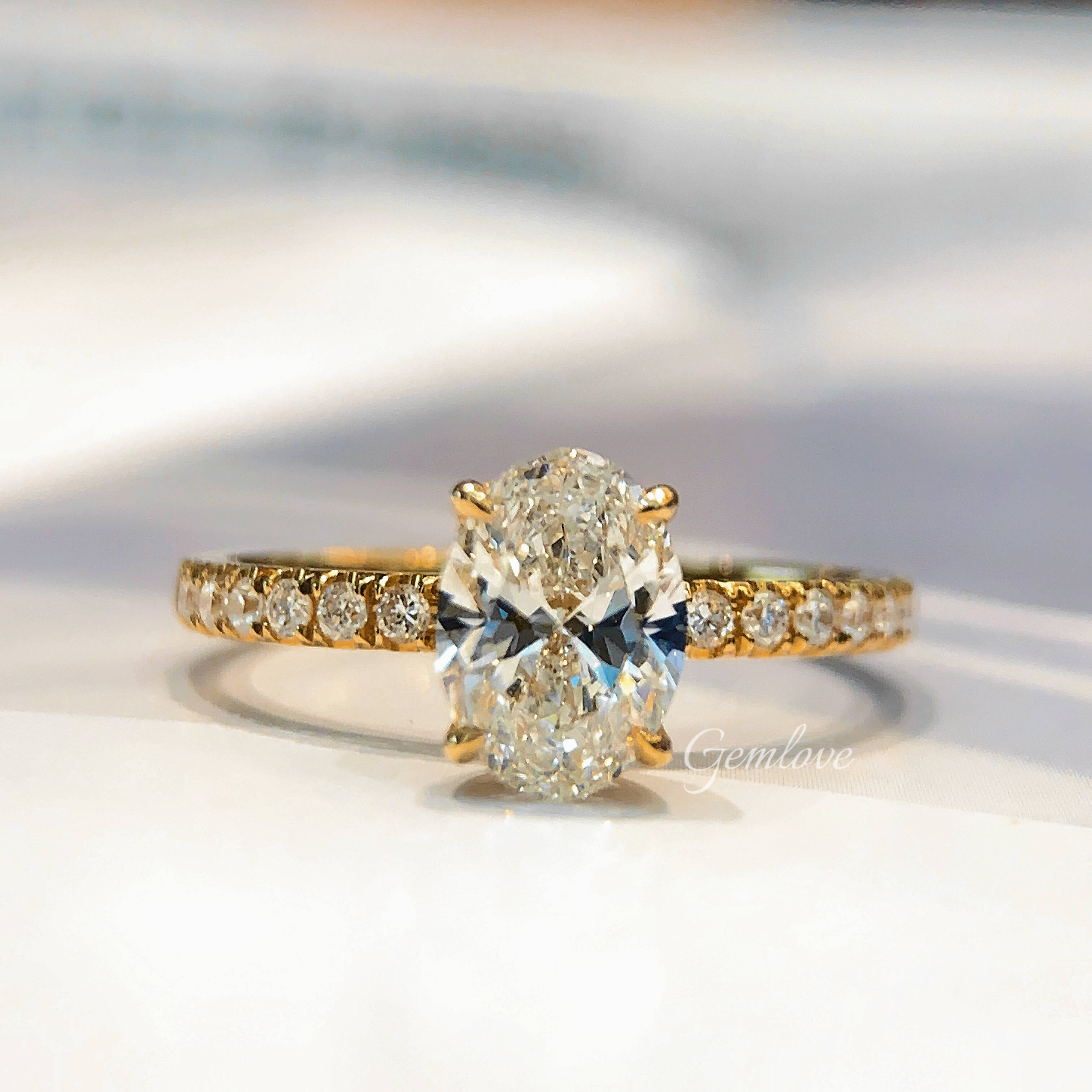 18k gold lab-grown diamond oval four-prong ring