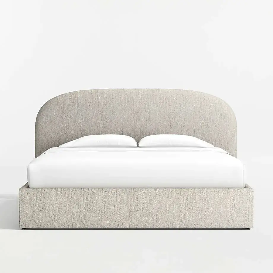Bulk supply of rounded upholstered headboards with padded support and textured fabric. Durable, stylish, and customizable, perfect for hotels, apartments, and large residential projects.