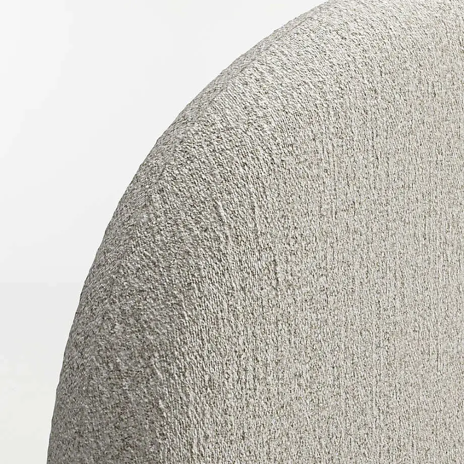 Bulk supply of rounded upholstered headboards with padded support and textured fabric. Durable, stylish, and customizable, perfect for hotels, apartments, and large residential projects.