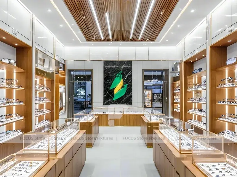 Warm Walnut Vision Store Interior with Symmetrical Display Corridor