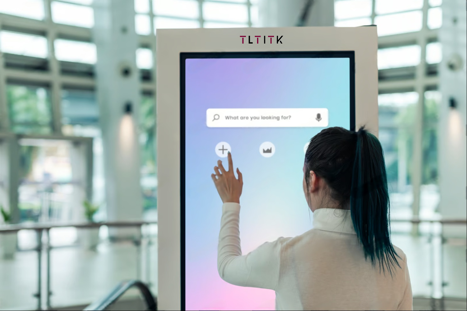 vertical advertising machine in use at a retail store