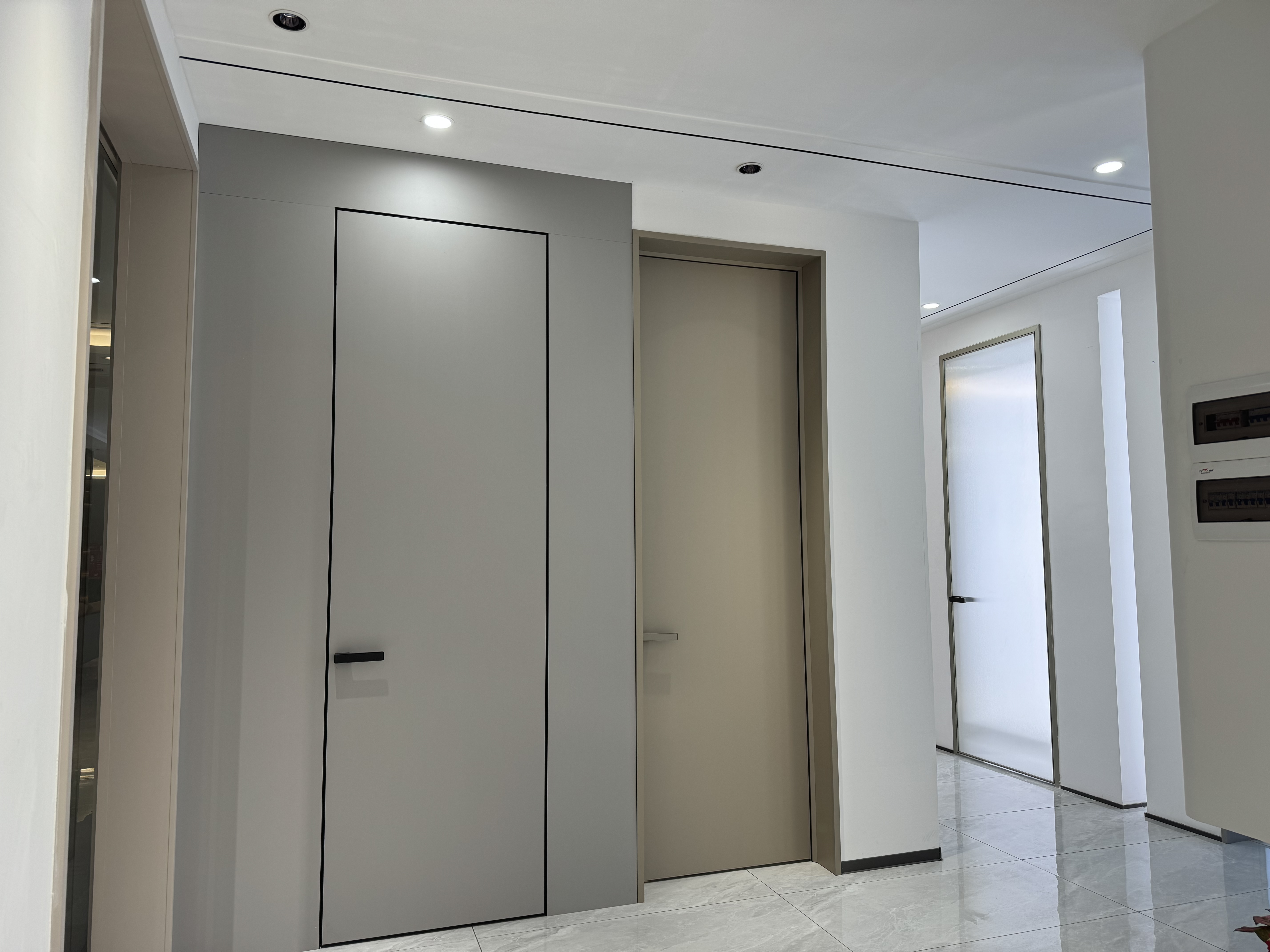 How can invisible doors help in creating a seamless and modern interior design?