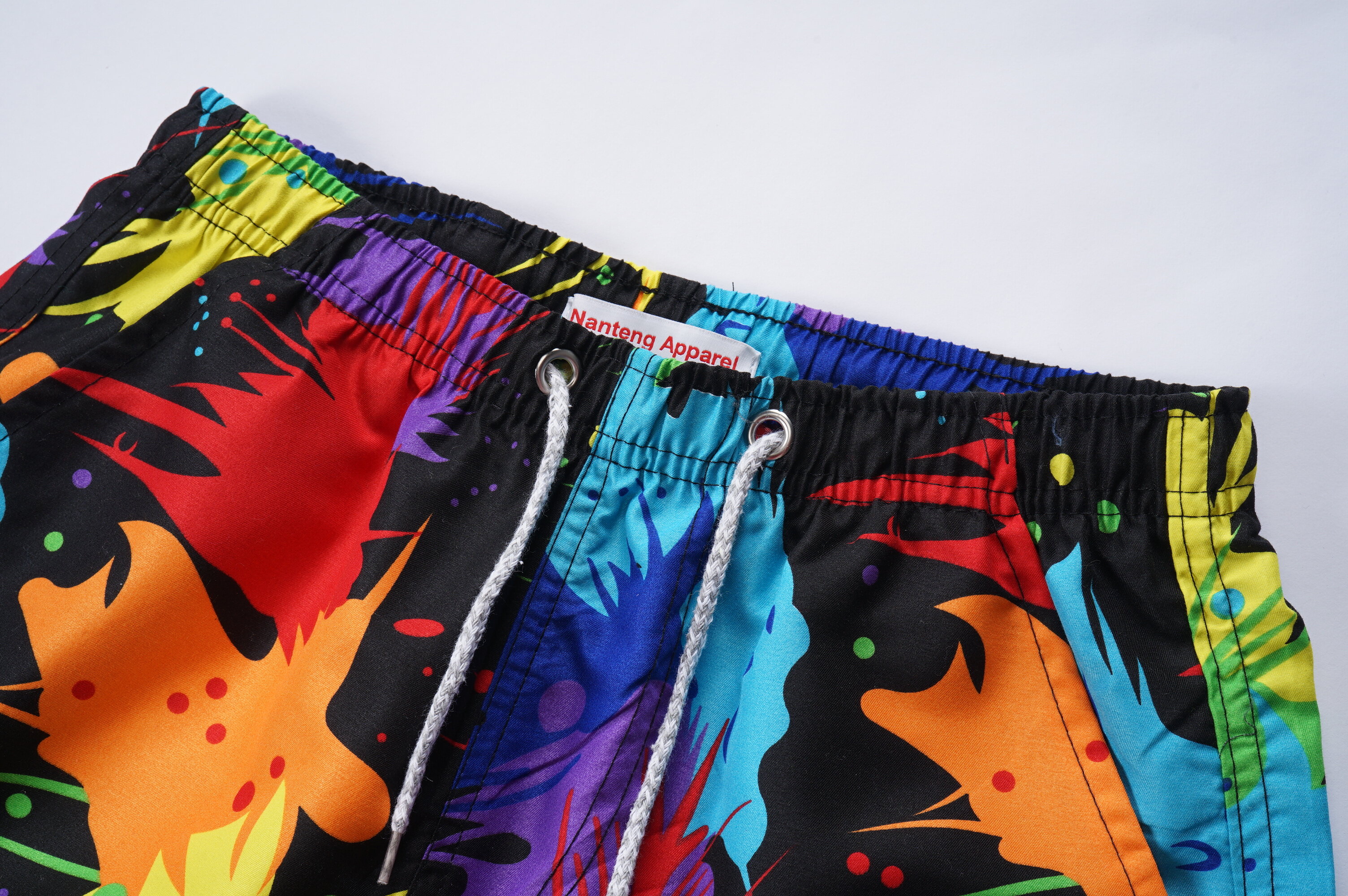 Shorts personnalisés, shorts de sublimation en polyester d'été, shorts de motif à encre Splash à la sublimation, shorts de pantalon quart