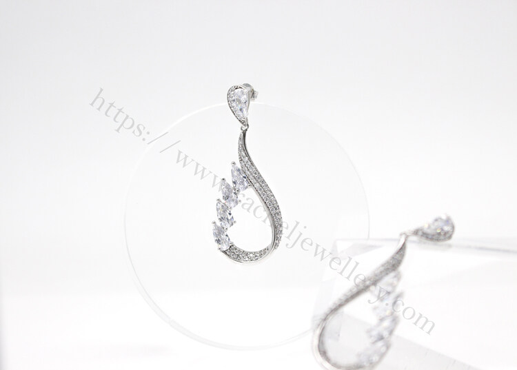 White gems earrings manufacturer.jpg