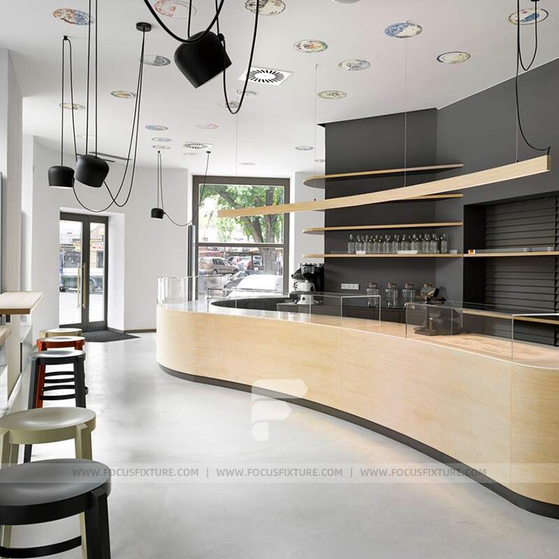 coffee shop designs; custom cafe counters; wooden retail counters; black back panel counters; modern checkout counters; customizable store fixtures; cafe furniture design; retail display solutions